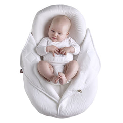 Red Castle Cocoonababy® & 1.0Tog Cocoonacover™ Bundle (White) - showing a baby on the support nest with the cocoonacover opened