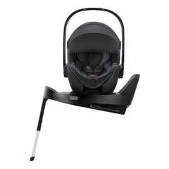 Britax Baby-Safe PRO i-Size Car Seat - Midnight Grey - side view, fitted to optional ISOFIX base with seat turned towards car door