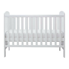 Ickle Bubba Coleby MINI Cot Bed - White - side view, mattress base at middle level