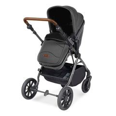 Ickle Bubba Cosmo All-in-One i-Size Travel System with ISOFIX Base - Graphite Grey - showing the parent-facing pushchair