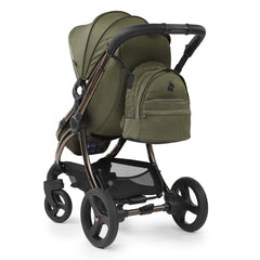 egg2 Luxury Bundle (Hunter Green) - showing the rear view of the pushchair with the backpack changing bag hanging from the handlebar