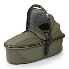 egg2 Luxury Bundle (Hunter Green) - showing the carrycot with its matching apron and hood