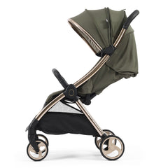 eggZ Stroller (Hunter Green) - sice view, showing the stroller with its seat reclined and hood further extended