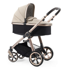 BabyStyle Oyster 3 Champagne LUXURY Bundle (Creme Brulee) - showing the carrycot and chassis together as the pram