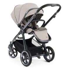 BabyStyle Oyster 3 Gunmetal ESSENTIAL Bundle (Stone) - showing the seat unit and chassis together as the pushchair in parent-facing mode