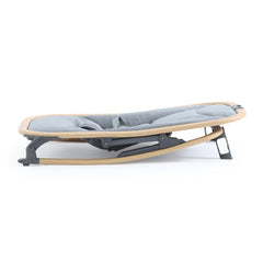 BabyStyle Oyster Rocker (Moon) - sideview, showing the rocker with its feet down to stop rocking motion