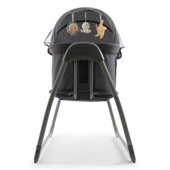 BabyStyle Oyster Swinging Crib (Fossil) - end view, showing the mobile toys hanging from the canopy