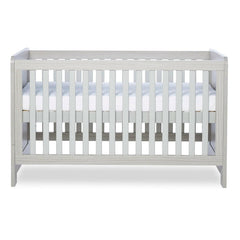 Ickle Bubba Pembrey Cot Bed - Ash Grey - side view, with mattress base at highest level