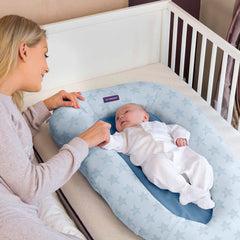 Clevamama ClevaSleep POD (Blue Stars) - lifestyle image, showing the pod with infant inside a cot
