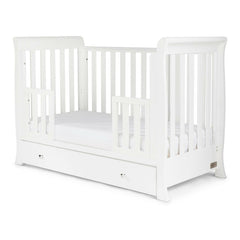 Ickle Bubba Snowdon MINI 4-in-1 Cot Bed & Drawer - White - quarter view, junior bed with protective mini side rails