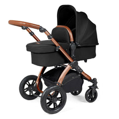 Ickle Bubba Stomp LUXE Travel System - Bronze/Midnight/Tan - showing the carrycot and chassis together as the pram