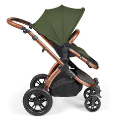 Ickle Bubba Stomp LUXE Travel System - Bronze/Woodland/Tan - side view, showing the forward-facing pushchair
