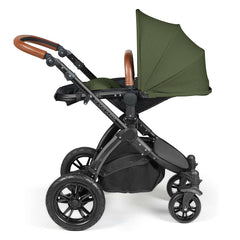 Ickle Bubba Stomp LUXE Travel System - Black/Woodland/Tan - showing the seat unit and chassis together as the pushchair in parent-facing mode with the seat reclined