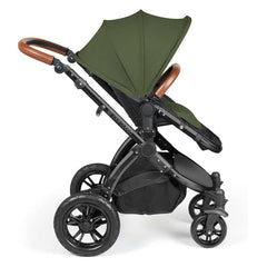 Ickle Bubba Stomp LUXE Travel System - Black/Woodland/Tan - showing the pushchair in forward-facing mode