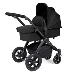 Ickle Bubba Stomp LUXE Travel System - Black/Midnight/Black - showing the carrycot and chassis together as the pram