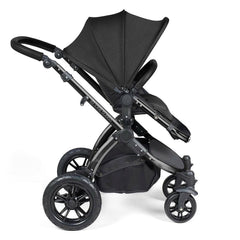Ickle Bubba Stomp LUXE Travel System - Black/Midnight/Black - side view, showing the forward-facing pushchair