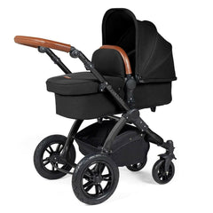 Ickle Bubba Stomp LUXE Travel System - Black/Midnight/Tan - showing the carrycot and chassis together as the pram