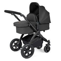 Ickle Bubba Stomp LUXE Travel System with Cirrus Car Seat & ISOFIX Base - Black/Charcoal/Black - showing the pram