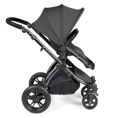 Ickle Bubba Stomp LUXE Travel System with Cirrus Car Seat & ISOFIX Base - Black/Charcoal/Black - side view, showing the forward-facing pushchair