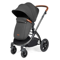 Ickle Bubba Stomp LUXE Travel System with Cirrus Car Seat & ISOFIX Base (Black/Charcoal/Tan) - showing the pushchair in forward-facing mode with the included footmuff