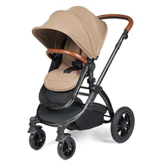 Ickle Bubba Stomp LUXE Travel System with Cirrus Car Seat & ISOFIX Base - Black/Desert/Tan - showing the pushchair in forward-facing mode