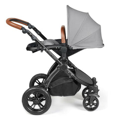 Ickle Bubba Stomp LUXE Travel System - Black/Pearl Grey/Tan - showing the seat unit and chassis together as the pushchair in parent-facing mode with the seat reclined