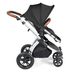 Ickle Bubba Stomp LUXE Travel System - Silver/Midnight/Tan - side view, showing the forward-facing pushchair with its seat upright