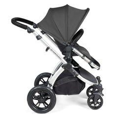 Ickle Bubba Stomp LUXE Travel System with Cirrus Car Seat & ISOFIX Base - Silver/Charcoal/Black - side view, showing the forward-facing pushchair
