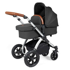 Ickle Bubba Stomp LUXE Travel System with Cirrus Car Seat & ISOFIX Base - Silver/Charcoal/Tan - showing the carrycot and chassis together as the pram