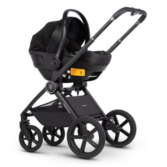 Venicci Upline Travel System 3-in-1 (Classic Grey) - showing the Engo i-Size Car Seat attached to the pushchair chassis using the included car seat adaptors