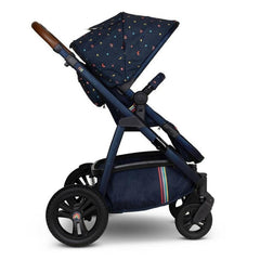 Cosatto Wow 3 Everything Bundle - Doodle Days - side view, showing the forward-facing pushchair