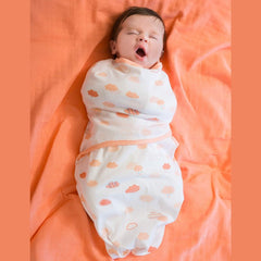 Clevamama Baby Swaddle to Sleep Wrap (Coral Clouds) - lifestyle image