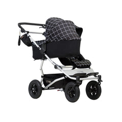Mountain Buggy Duet v3.2 Carrycot Plus (Grid) - showing the parent-facing carrycot fixed to the pushchair with a forward-facing seat (pushchair not included, available separately)