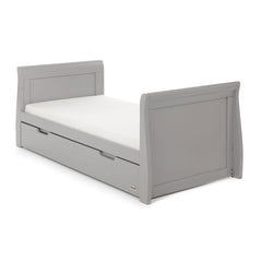 Obaby Stamford Sleigh Cot Bed (Warm Grey) - quarter view, shown here as the junior bed with the mattress