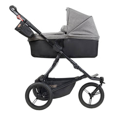 Mountain Buggy Urban Jungle - Luxury Collection Bundle (Herringbone) - side view, showing the carrycot and chassis in use as the pram