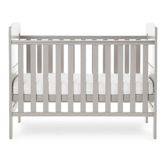 Obaby Grace Mini Cot Bed (Warm Grey) - side view, shown with the mattress base at its middle level (mattress not included, available separately)