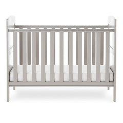 Obaby Grace Mini Cot Bed (Warm Grey) - side view, shown with the mattress base at its lowest level (mattress not included, available separately)