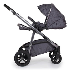 Cosatto Wow Continental Pushchair (Fika Forest) - side view, shown here in parent-facing mode with the seat fully reclined and the leg rest raised