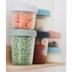 BEABA Toddler Food Storage Starter Pack - 8 Clip Containers - showing some containers filled with food, clipped together and stacked