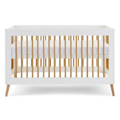 Obaby MAYA Cot Bed (White with Natural) - showing the cot with the mattress base at its highest level (mattress not included, available separately)