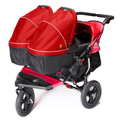 Out n About Nipper Double Carrycot - Hood Fabric (Carnival Red) - showing a double pushchair with two carrycots each fitted with the replacement hood fabric (carrycots and pushchair not included, available separately)