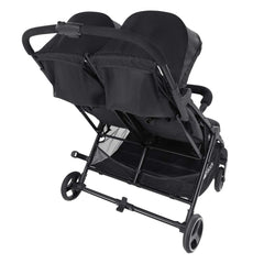 Hauck Swift X Duo Double Pushchair (Black) - rear view, showing the large storage baskets and foot-operated brake