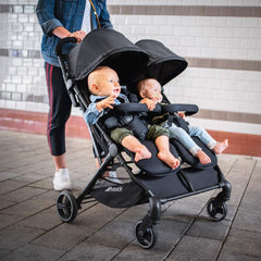 Hauck Swift X Duo Double Pushchair (Black) - lifestyle image, shown here with two black hoods