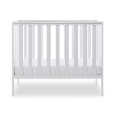Obaby Bantam Space Saver Cot (White) - side view, shown with mattress base at its lowest level