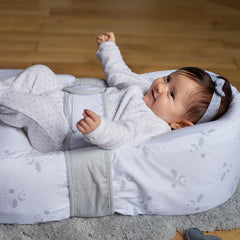 Red Castle Cocoonababy Pod Support Nest (Dreamy Cloud) - showing the Cocoonababy with an infant being held in place by the tummy band