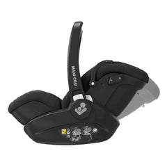 Maxi-Cosi Marble i-Size Infant Carrier with Base (Essential Black) - side view, showing the reclining seat