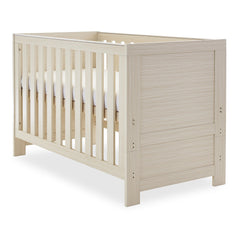 Obaby Nika Cot Bed (Oatmeal) - shown here as the cot with the mattress base as its highest level (mattress and bedding not included)