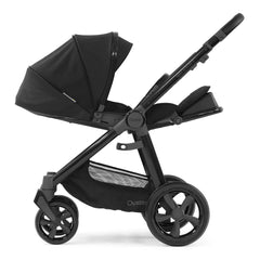 BabyStyle Oyster 3 Black ESSENTIAL Bundle (Pixel) - showing the parent-facing pushchair with the seat fully reclined and leg rest raised