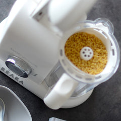 BEABA Pasta/Rice Cooker Insert (White) - shown here filled with pasta and inserted into a Babycook machine