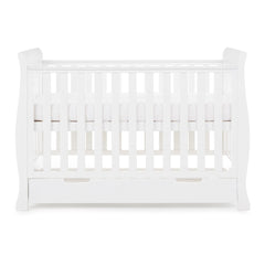 Obaby Stamford Mini Sleigh Cot Bed with Drawer (White) - side view, shown here with the mattress base at its highest level (mattress not included)